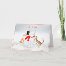 Katzen, die im Schnee Weihnachtskarte spielen