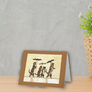 Katzen im Schnee mit Notizkarte für Regenschirme Karte