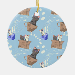 Katzen in Kiste und Milchfallen auf blau Keramik Ornament