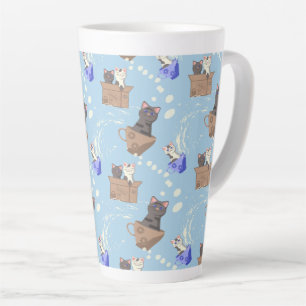 Katzen in Kiste und Milchfallen auf blau Milchtasse