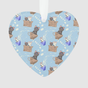 Katzen in Kiste und Milchfallen auf blau Ornament