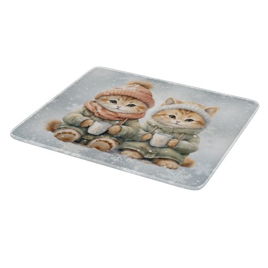 Katzen trinken heiße Schokolade im Schnee Schneidebrett (Ecke)