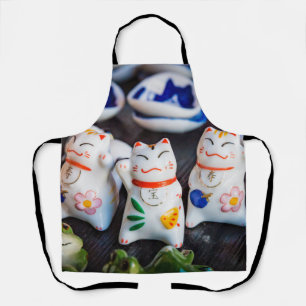 Katzenfiguren werden schürze