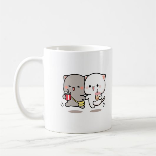 Katzenpfirsich und Goma muchi Kaffeetasse (Links)