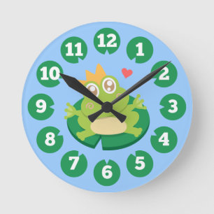 Kawaii frog with sparkling eyes on a lily pad runde wanduhr