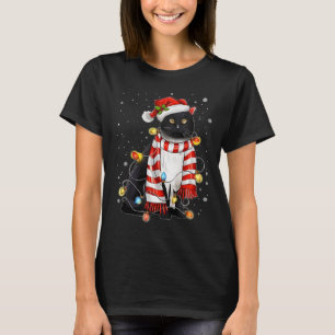Kawaii Niedliche schwarze Katze Santa hat sich im  T-Shirt