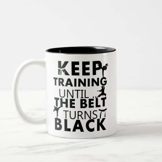 Keep training until the belt turns black zweifarbige tasse (Links)
