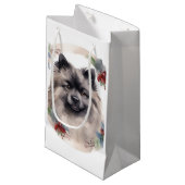 Keeshond Christmas Wreath Festivals Kleine Geschenktüte (Vorderseite Schrägansicht)
