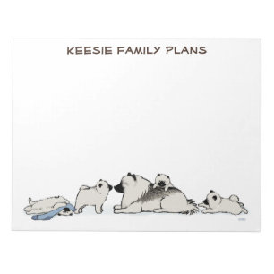 Keeshond Familie mit blauem Socken Notizblock
