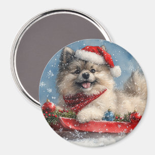 Keeshond-Hund im Schlitten Lass es schneien Weihna Magnet