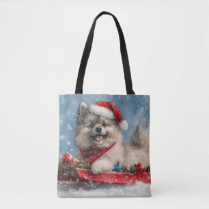 Keeshond-Hund im Schlitten Lass es schneien Weihna Tasche