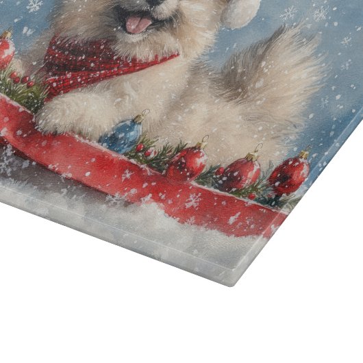 Keeshond Hund in Sledge Lass es Schnee Weihnachten Schneidebrett (Ecke)
