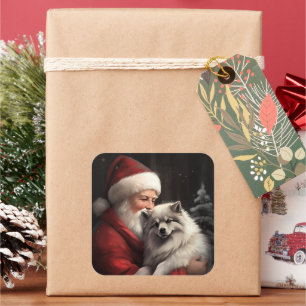 Keeshond mit Santa Claus Festive Weihnachten Quadratischer Aufkleber