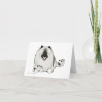Keeshond mit Welpen