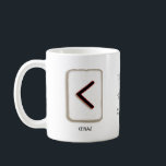 Kenaz RuneStone-Tasse Kaffeetasse<br><div class="desc">Die Kenaz Rune repräsentiert kreatives Feuer. Diese Rune symbolisiert den Einfallsreichtum und die Qualitäten der Transformation, des kontrollierten Feuers, der Schöpfung, der Schöpfung, des Herzens, der Schmiede, der Leidenschaft, der Künstler und Handwerker, der Fantasie & Innovation, der Kinsmen und der Regeneration durch Zerstörung oder Opfer. Von der Göttin Freyja regiert....</div>