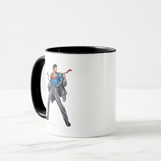 Kent wechselt in Superman Tasse (Vorderseite Links)