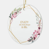 Keramik Ornament mit Blume und eine kleine Note. (Links)