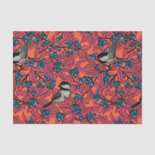 Kichervögel auf Blaubeeren-Ästen auf Orange Seidenpapier