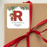 Kids Elf Initial R Christmas Quadratischer Aufkleber<br><div class="desc">Gib dieses Weihnachtsfest das Geschenk personalisierten Charmes! Unsere Monogramm-Aufkleber mit dem Elf des Weihnachtsmannes,  die sich hinter dem Buchstaben R versteckt,  sind eine einzigartige und durchdachte Möglichkeit,  Ihre Liebe zu zeigen. Passen Sie mit einem Namen,  Jahr und einem herzlichen Gruß an. Machen Sie Ihre Weihnachtsgeschenke auffällig!</div>