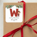 Kids Initial W Christmas Quadratischer Aufkleber<br><div class="desc">Gib dieses Weihnachtsfest das Geschenk personalisierten Charmes! Unsere Monogramm-Aufkleber mit dem Elf des Weihnachtsmannes,  der sich hinter dem Buchstaben W versteckt,  sind eine einzigartige und durchdachte Möglichkeit,  Ihre Liebe zu zeigen. Passen Sie mit einem Namen,  Jahr und einem herzlichen Gruß an. Machen Sie Ihre Weihnachtsgeschenke auffällig!</div>