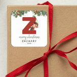 Kids Initial Z Christmas Quadratischer Aufkleber<br><div class="desc">Gib dieses Weihnachtsfest das Geschenk personalisierten Charmes! Unsere Monogramm-Aufkleber mit Santas Elf,  die sich hinter dem Buchstaben Z verstecken,  sind eine einzigartige und durchdachte Möglichkeit,  Ihre Liebe zu zeigen. Passen Sie mit einem Namen,  Jahr und einem herzlichen Gruß an. Machen Sie Ihre Weihnachtsgeschenke auffällig!</div>