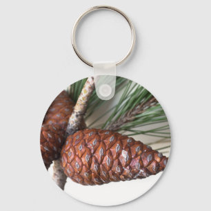Kiefernzweig mit Pinecone Schlüsselanhänger