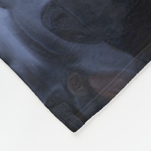 Kiesel und Felsen entlang der Küste des Ozeans Fleecedecke (Ecke)