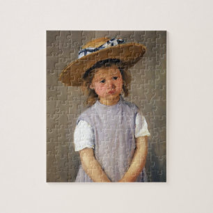 Kind in einem Strohhut Puzzle