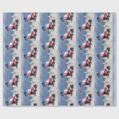 Kind sieht Santa Claus an, am Strand sitzen Geschenkpapier (Flach)