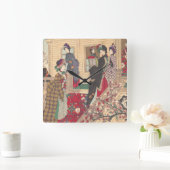 Kinder, die unter Pflaumenbäumen im Schnee spielen Quadratische Wanduhr (Zuhause)