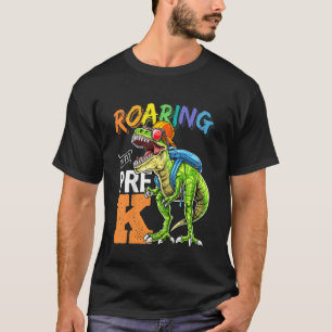 Kinder, die vor dem K Dinosaurier nach hinten in d T-Shirt