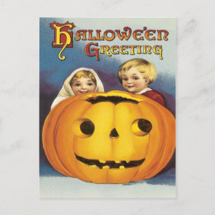 Kinder hinter einem Kürbis Vintage-Postkarte Postkarte