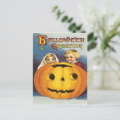 Kinder hinter einer Vintagen Postkarte des Pumpkin (Stehend Vorderseite)
