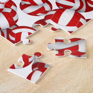 Kinder in den Farben des roten weißen Volleyballte Puzzle