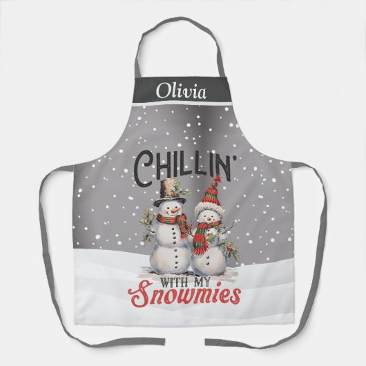 Kinder mit meiner Schneemasse, die einen Urlaub na Schürze (Vorderseite)