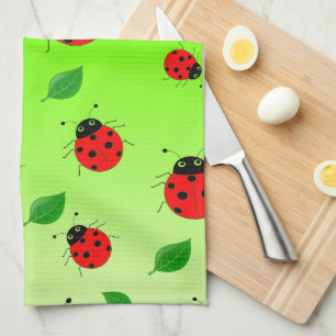 Kinder Niedlicher roter Ladybug und grün verlassen Geschirrtuch