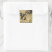 Kinderspiele: Details eines Kindes mit einem Quadratischer Aufkleber (Tasche)