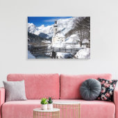 Kirche im Schnee mit den Alpen Leinwanddruck (Insitu (Wohnzimmer))