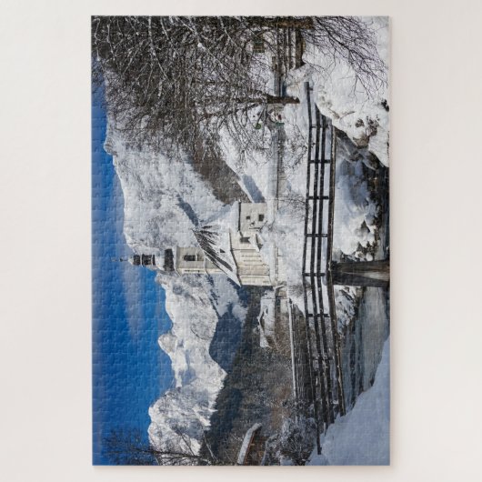 Kirche im Schnee mit den Alpen Puzzle (Vertikal)