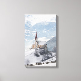 Kirche in einer alpinen Winterlandschaft Leinwanddruck