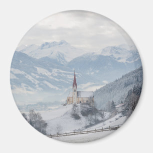 Kirche in Zillertal im runden Magneten des Winters Magnet