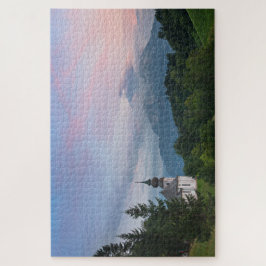 Kirche mit den Alpen Berge bei Sonnenuntergang Puzzle