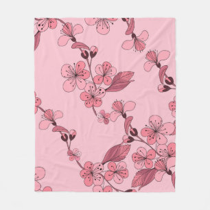 Kirschblüte in rosa Farbe auf weißem Hintergrund. Fleecedecke