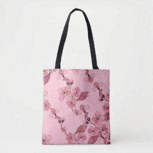 Kirschblüte in rosa Farbe auf weißem Hintergrund. Tasche