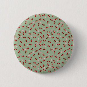 Kirschmuster auf grünem Hintergrund Button