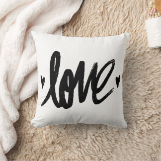 Kissen mit handgeschriebener Typografie und süßem 