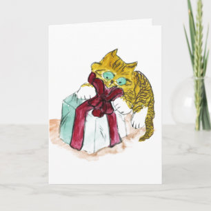 Kitten entpackt ein gemütliches, gemeines feiertagskarte