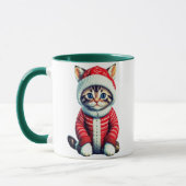 Kitten in einem rot-weißen Weihnachtskraut Tasse (Links)