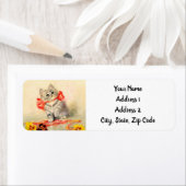 Kitten mit einem roten Band (Insitu)