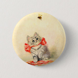 Kitten mit einem roten Band Button